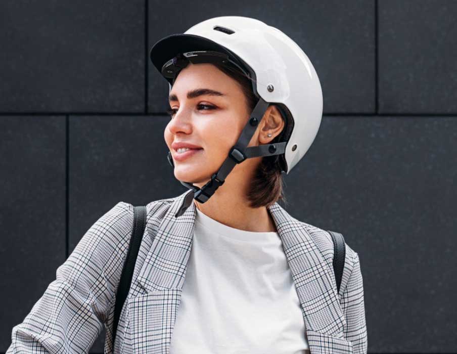 Woman on a scooter with Cambox helmet camera