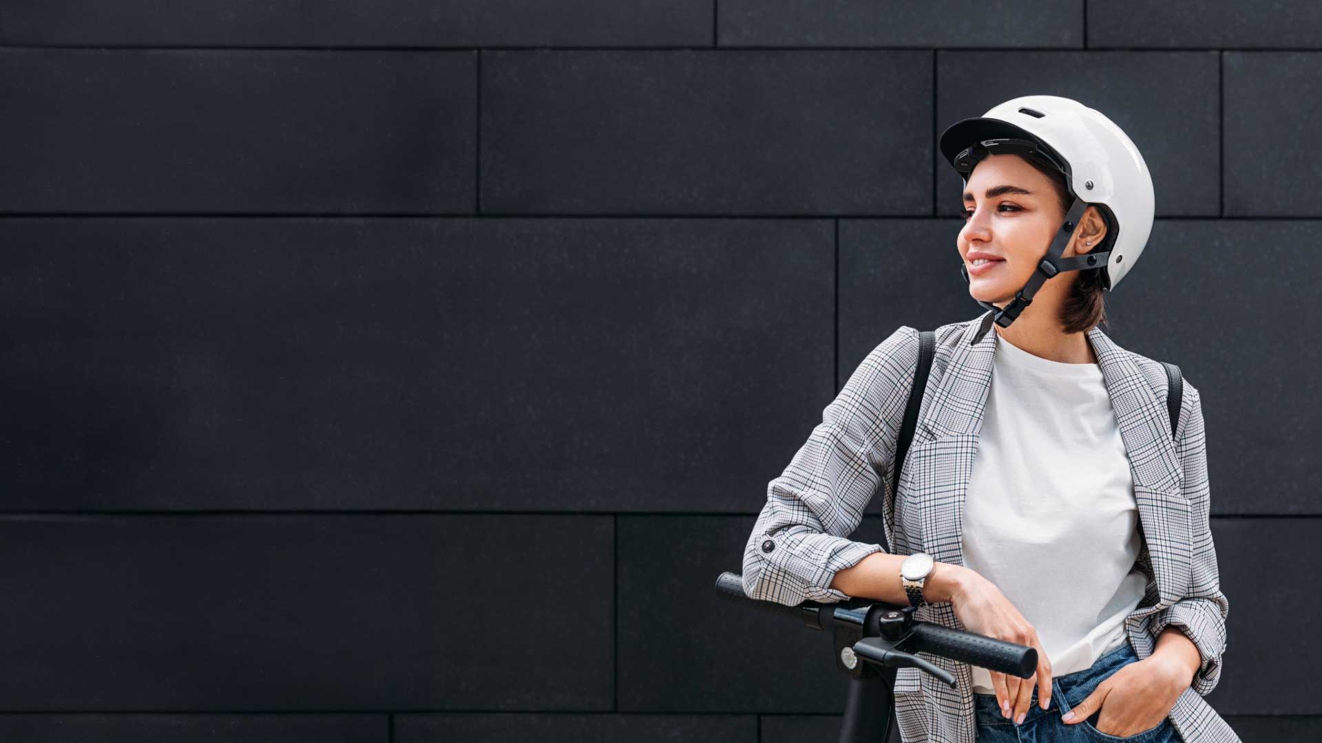 Woman on scooter with helmet camera